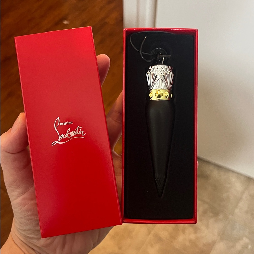 New in box Louboutin Red Lipstick Rouge 001M